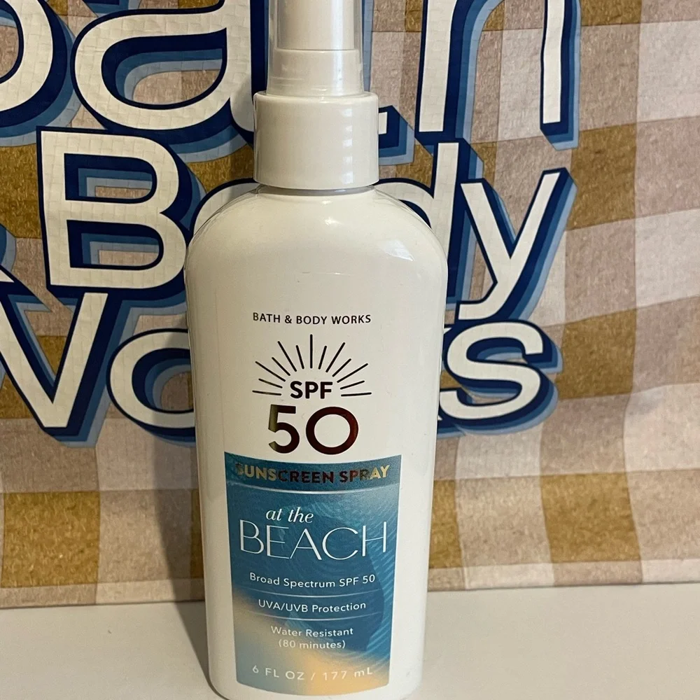 SPF 50 Sunscreen Spray At The Beach - Picture 1 of 1